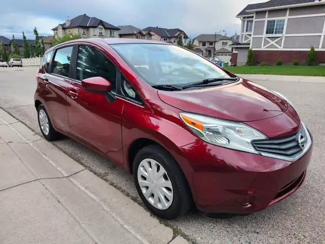 2016 Nissan Versa Note SV amazing on gas Compare fit civic golf