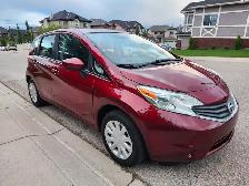 2016 Nissan Versa Note SV amazing on gas Compare fit civic golf