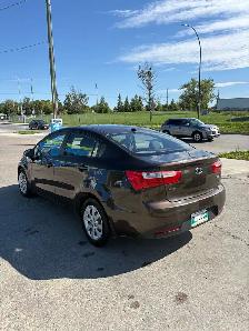 2013 Kia Rio, clean title , safetied - Photo 4