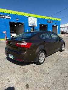 2013 Kia Rio, clean title , safetied - Photo 5