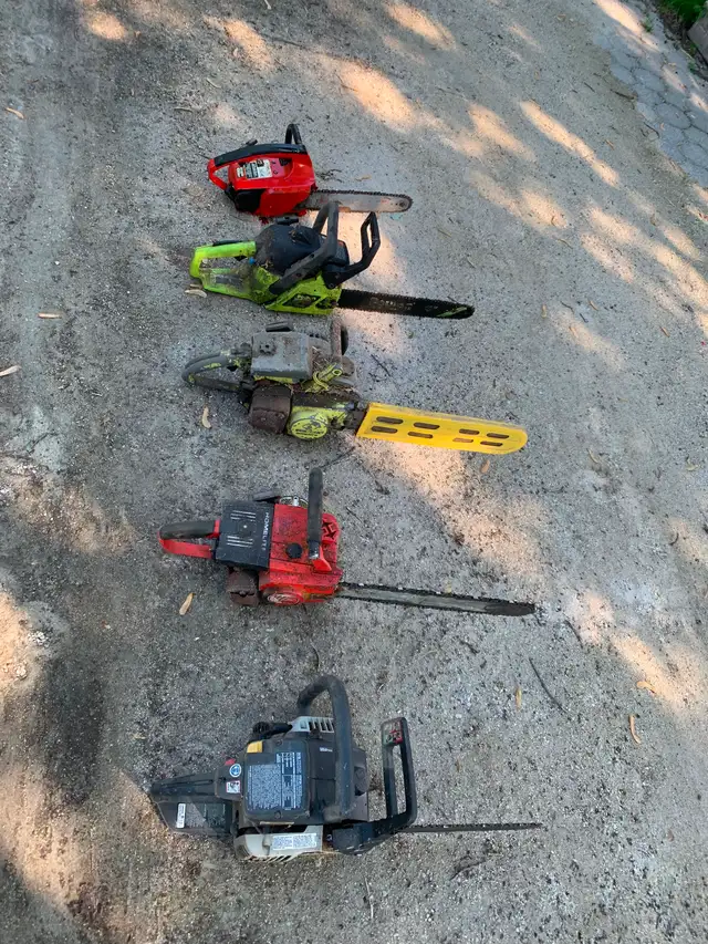5 chainsaws for parts or repair