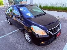 2012 Nissan Versa 1.6 S 4dr Sedan (1.6L 4cyl 5M) - Photo 4