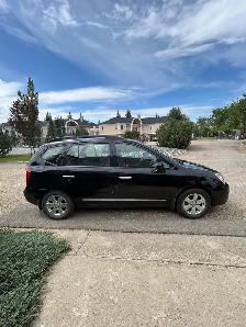 2009 Kia Rondo EX - Photo 3