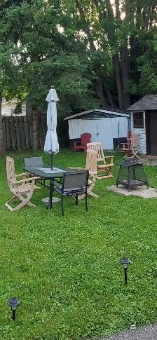 Set de patio 4 chaise..petit foyer et parasol et  150$ négo - Photo 5