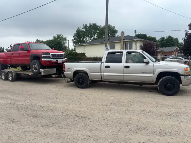 2 2005 GMC Sierra 2500/3500 Duramaxs & trailer