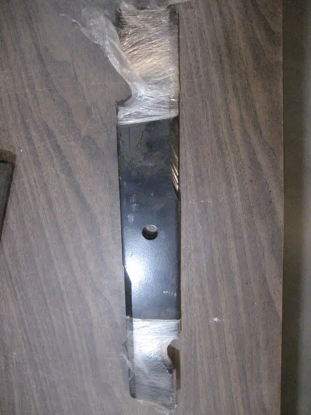 2 Exmark mulch blades # 103-6584, 17 29/32'