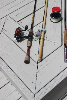 Fishing rods and tackle box. - Photo 2