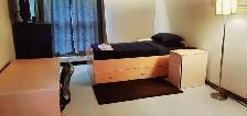 Large Furnished Room | Weekly & Monthly Rentals Available - Photo 2