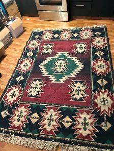ONE   5'3' X 7'9' AREA CARPET    ESTATE