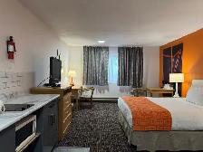 Affordable Weekly & Monthly Hotel Rooms – Clean & Comfortable - Photo 4