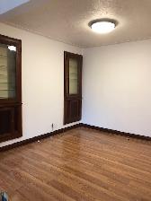 1 bedroom on main level, large backyard, parking and laundry - Photo 3