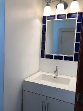 1 bedroom on main level, large backyard, parking and laundry - Photo 9