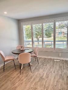 Newly Renovated 2 bedroom   den main floor of duplex - Photo 2