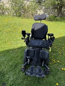 Quantum  power wheelchair with tilting and eleveted footrest too