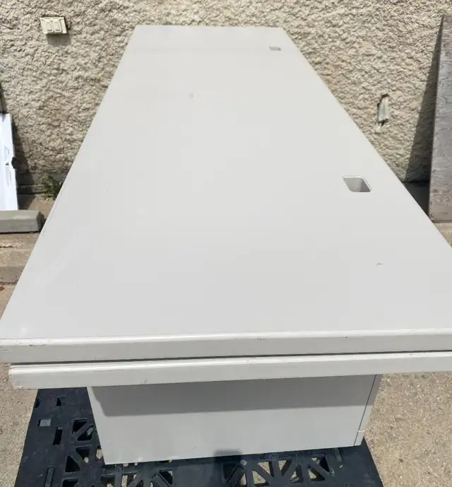 Three heavy duty metal cabinets