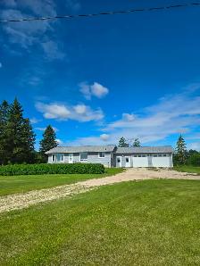 80 acres with house and farmyard in a peaceful setting