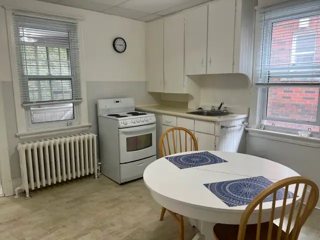 Bright Fully Furnished Bachelor Apt with Sun Porch