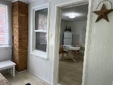 Bright Fully Furnished Bachelor Apt with Sun Porch - Photo 10