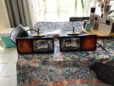 Snow plow head light and signal combo
