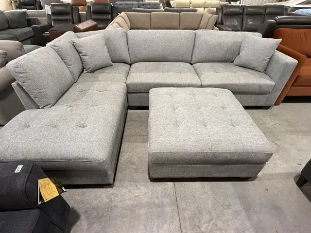 Fabric sectional with storage ottoman