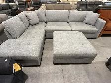 Fabric sectional with storage ottoman