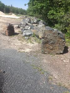 BLACK GRANITE BOULDERS WE DELIVER AND INSTALL