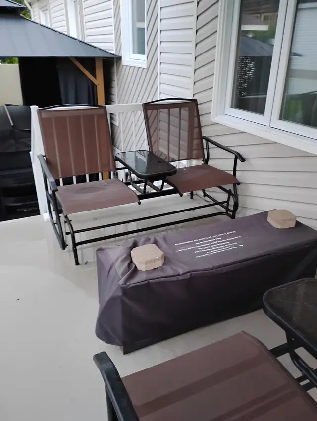 2 seated rocking chairs with table for$ 150