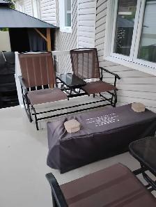 2 seated rocking chairs with table for$ 150