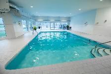 MAGNIFIQUE 3 1/2 IMMEUBLE AVEC PISCINE INTÉRIEURE - Photo 9