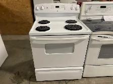 Cuisinière blanche ronds serpentins GE