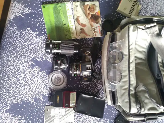 Canon T70 film camera and accessories
