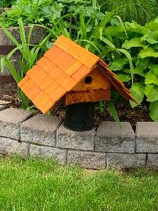 Bird house with cedar shingles