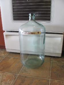 2 grosse bouteilles en verre de 23 litres a vendre