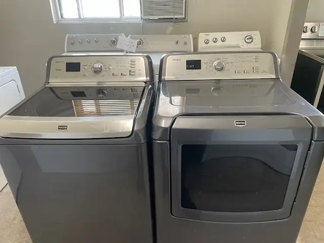 Laveuse sécheuse top load grises grande capacité Maytag