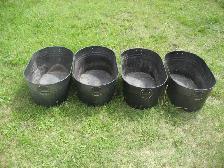 4 Large metal tubs / planters