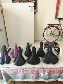 9 BIKE SEATS FOR SALE AND BIKE PUMP