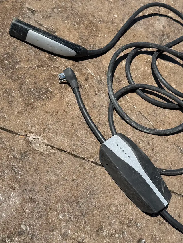 Tesla Mobile Charger at home or on the road charging