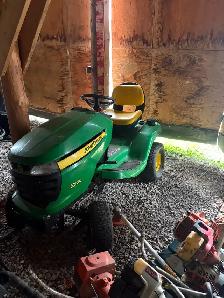 John Deere X300 lawn tractor with deck