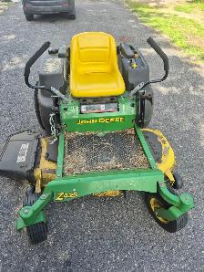John Deer Zero turn z425 lawn tractor with attachment - Photo 4