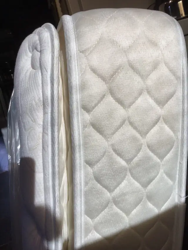 Two Serta Twin mattresses and box springs/foundations for sale