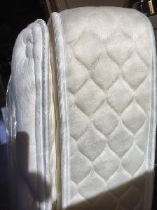 Two Serta Twin mattresses and box springs/foundations for sale