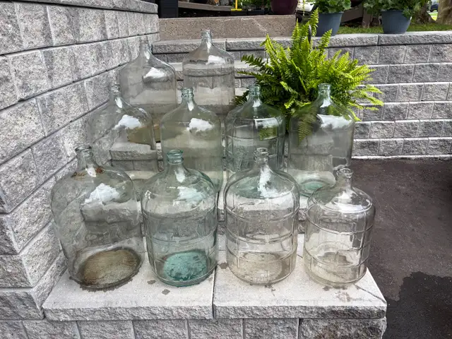 10 Glass Carboys. (Please Ad Info)