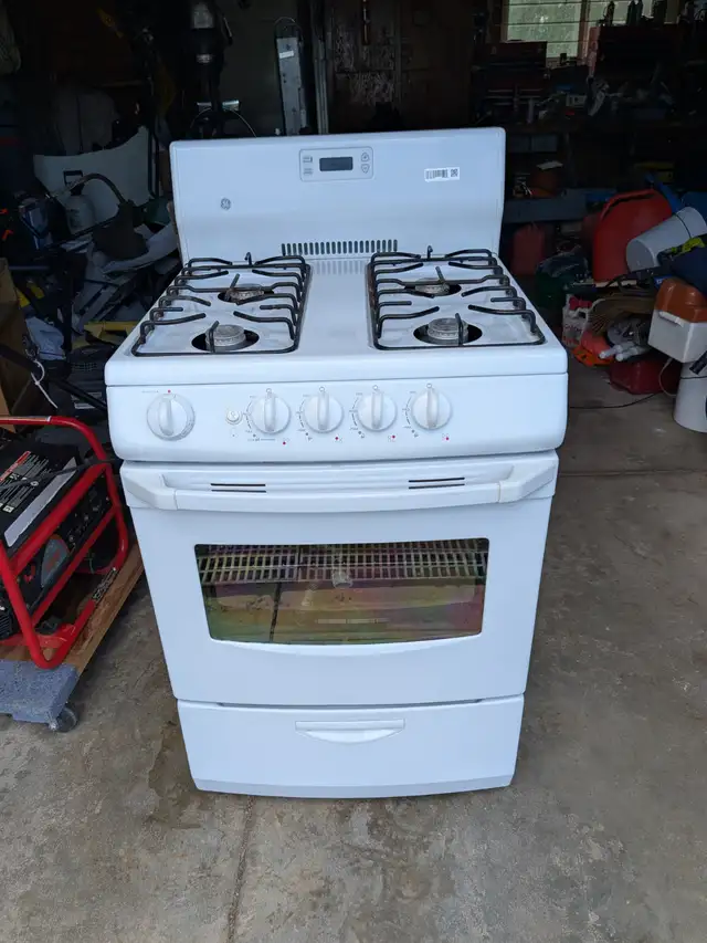 24 Inch GE Gas Stove for sale.
