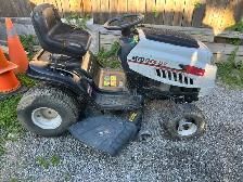 riding lawnmower ( needs work )