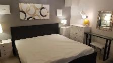 Like new king-size mattress and protector