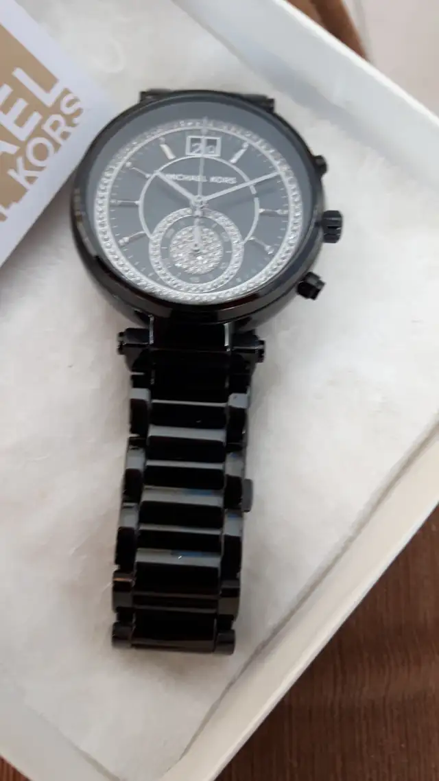 MONTRE NEUVE FEM MICHAEL KORS INSTRUCTIONS VALEUR $350.00 TAXES