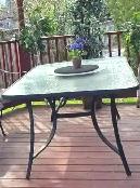 Krinkled glass patio table in great shape.