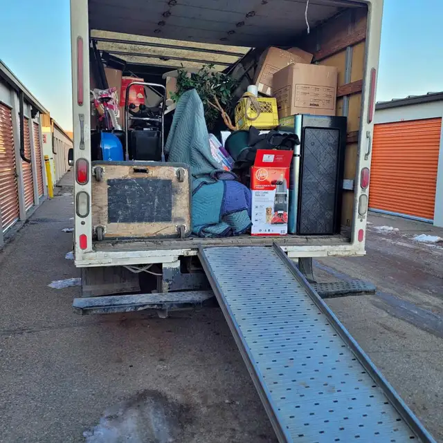 Moving truck with movers