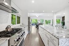 2253sqft 3bdrm bungalow situated on a 0.5acre riverfront lot! - Photo 3