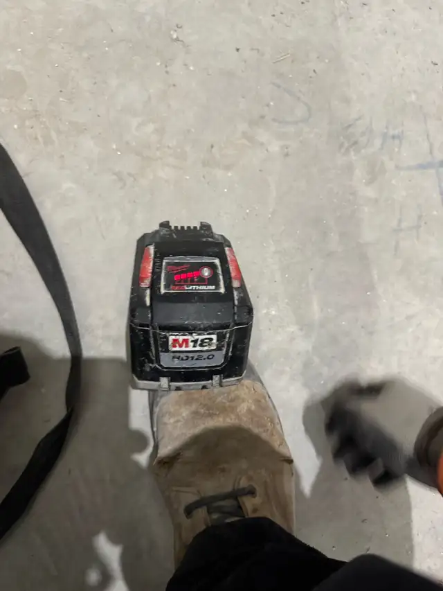Milwaukee 12 Amp $ 5 Amp battery